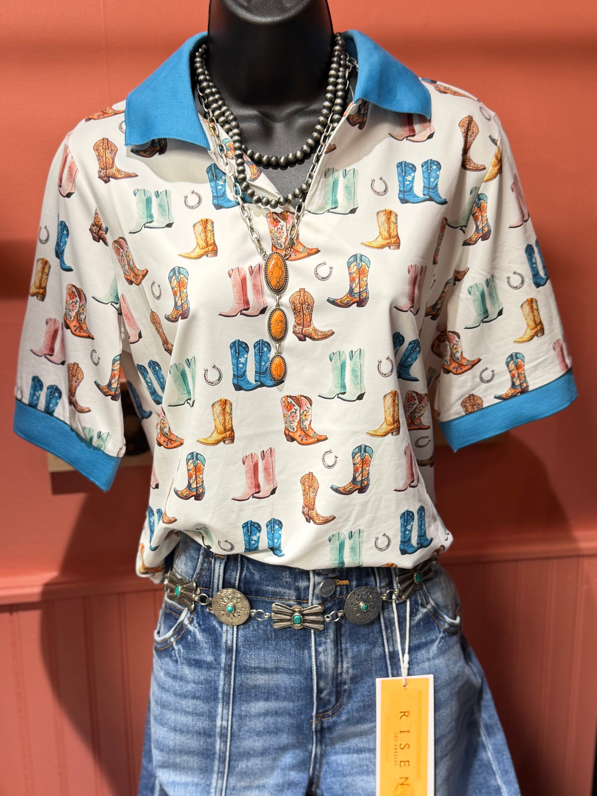 Shop Envi Me tops The West Of Boots Polo Shirt