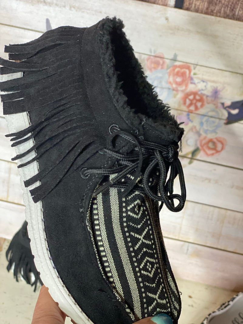 Not Rated Footwear The Gypsy Jazz Black Trinidad Tribal Fringe Sherpa Cozy Moc