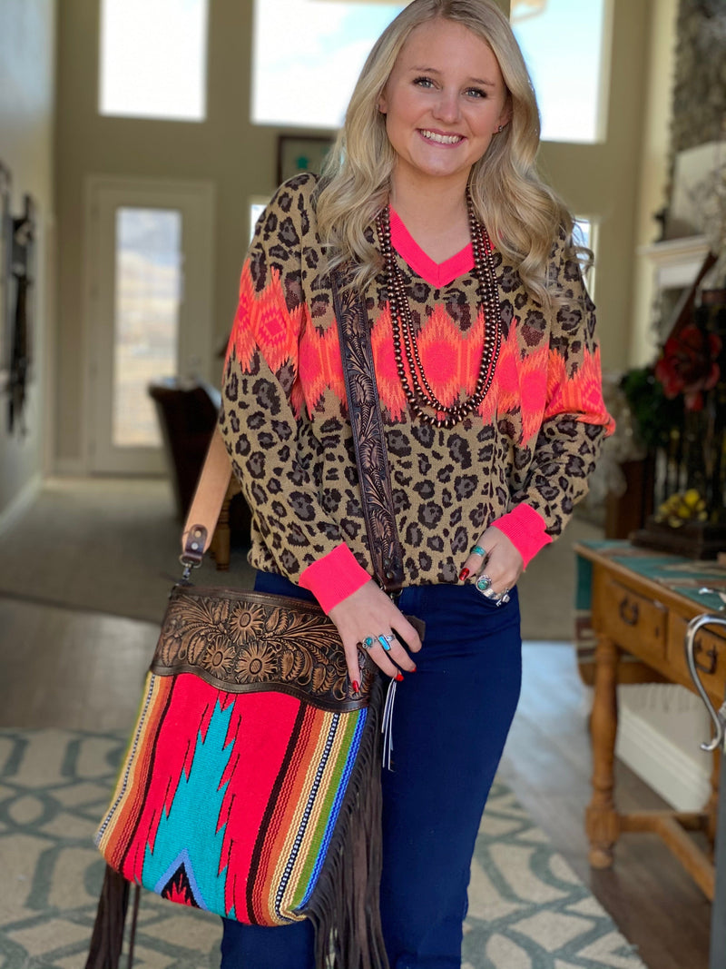 Shop Envi Me Arm Candy Red multi The Rojo Casa Grande Tooled Leather Top Navajo Fringe Bag