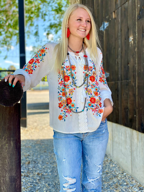 Shop Envi Me tops The White Twin Sisters Embroidered Top